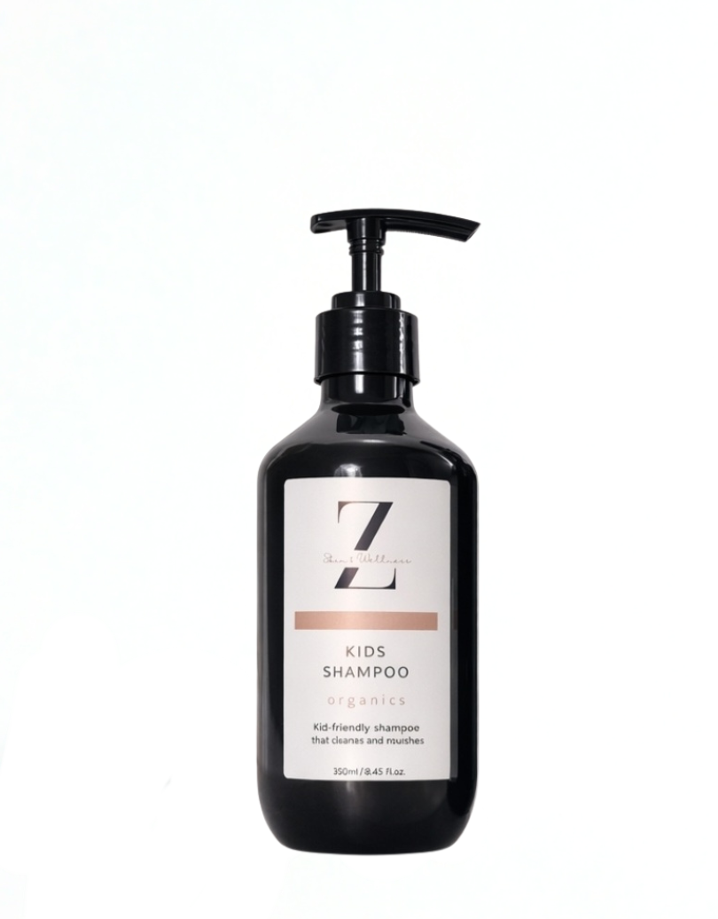 Black shampoo bottle with a label on a white background